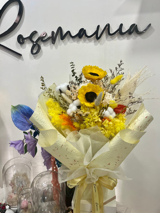 Bouquet of flowers with yellow sunflowers 